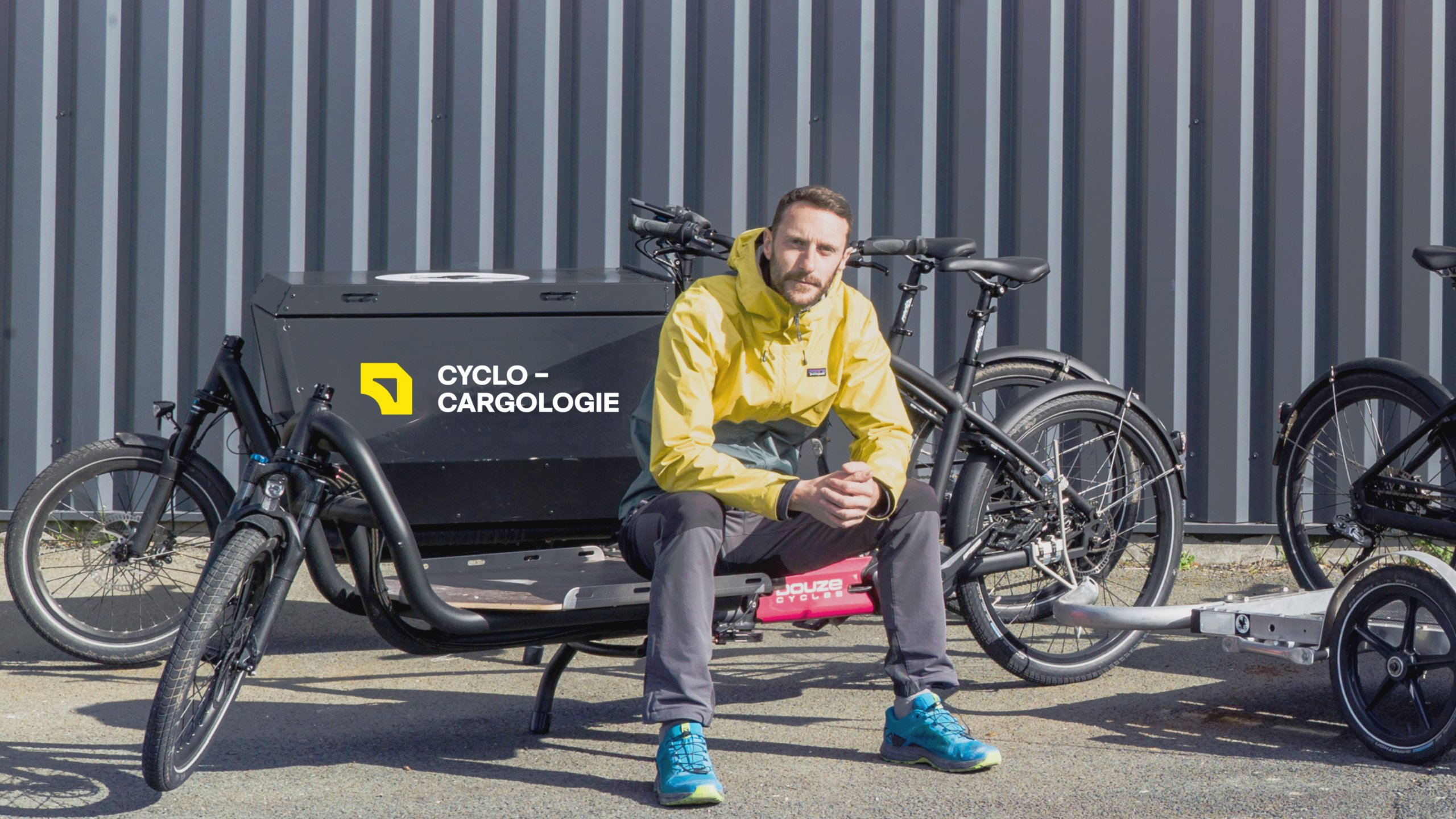 Man sat on cargo bike Cyclo Cargo